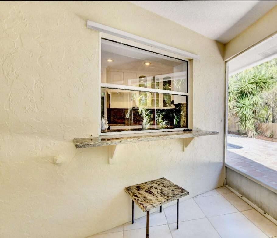 17768 Maplewood Drive Boca Raton, FL 33487 - Photo 38 of 50 a kitchen with a sink and a window