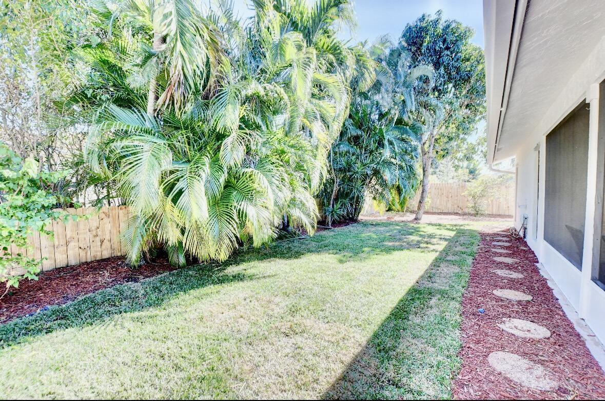 17768 Maplewood Drive Boca Raton, FL 33487 - Photo 39 of 50 a view of yard with pathway