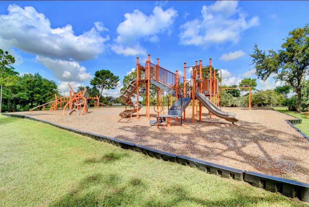 17768 Maplewood Drive Boca Raton, FL 33487 - Photo 44 of 50 a view of a park with swings