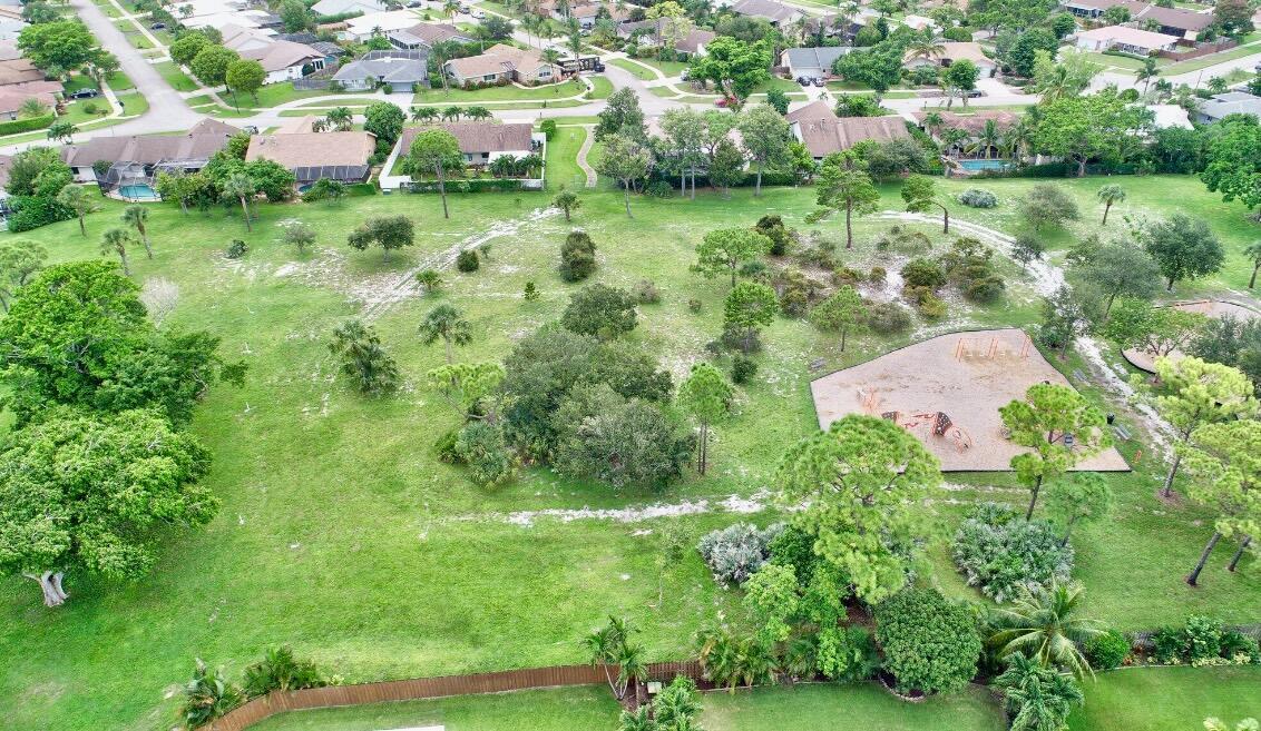 17768 Maplewood Drive Boca Raton, FL 33487 - Photo 50 of 50 an aerial view of residential houses with outdoor space and trees