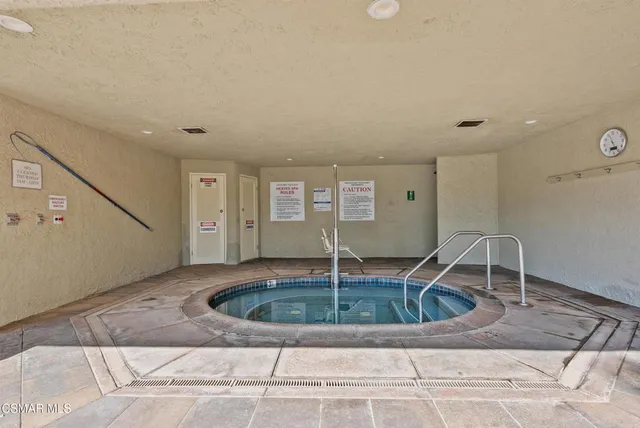 a view of a backyard with sitting area