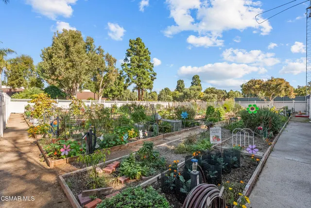 a view of a livingroom with furniture and staircase
