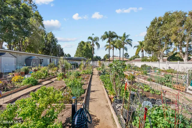 a view of a living room and kitchen
