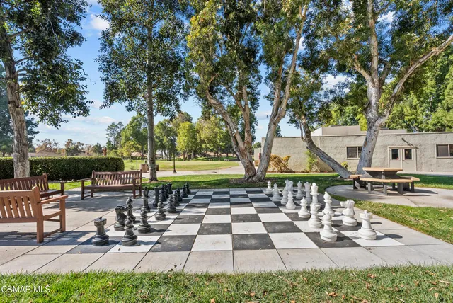 a view of a hall with wooden floor