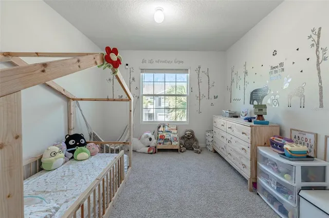 a bedroom with furniture and a bed