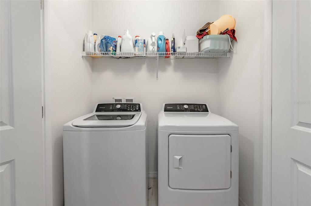 3327 Pleasant Willow Court Brandon, FL 33511 - Photo 24 of 28 a utility room with dryer and washer