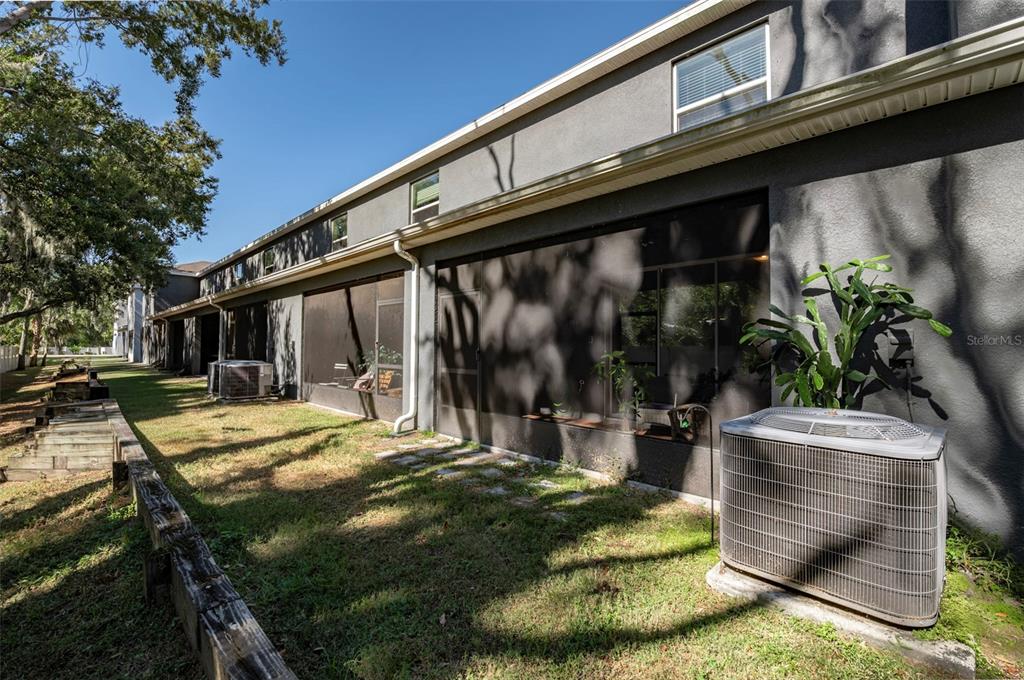 3327 Pleasant Willow Court Brandon, FL 33511 - Photo 27 of 28 a view of a house with backyard and sitting area