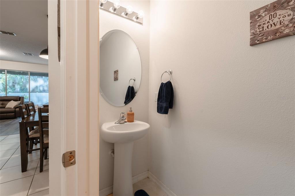 3327 Pleasant Willow Court Brandon, FL 33511 - Photo 5 of 28 a bathroom with a sink and a mirror