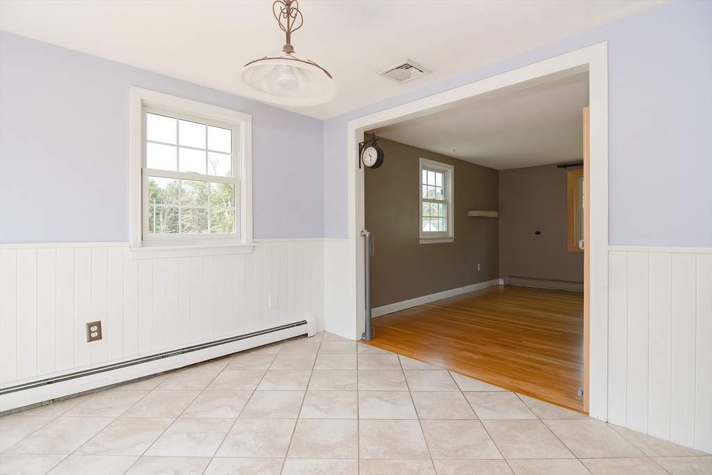 633 Williams Street Dighton, MA 02764 - Photo 11 of 41 a view of an empty room with window and wooden floor