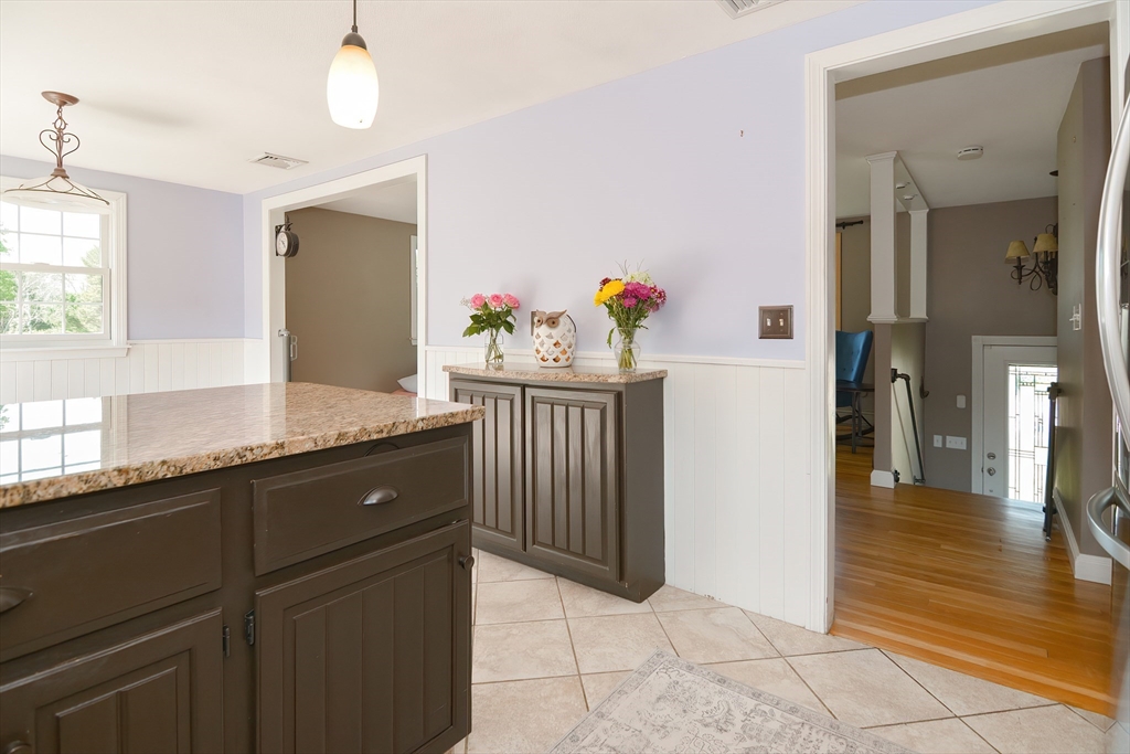 633 Williams Street Dighton, MA 02764 - Photo 18 of 41 a spacious bathroom with a granite countertop sink a mirror and a shower
