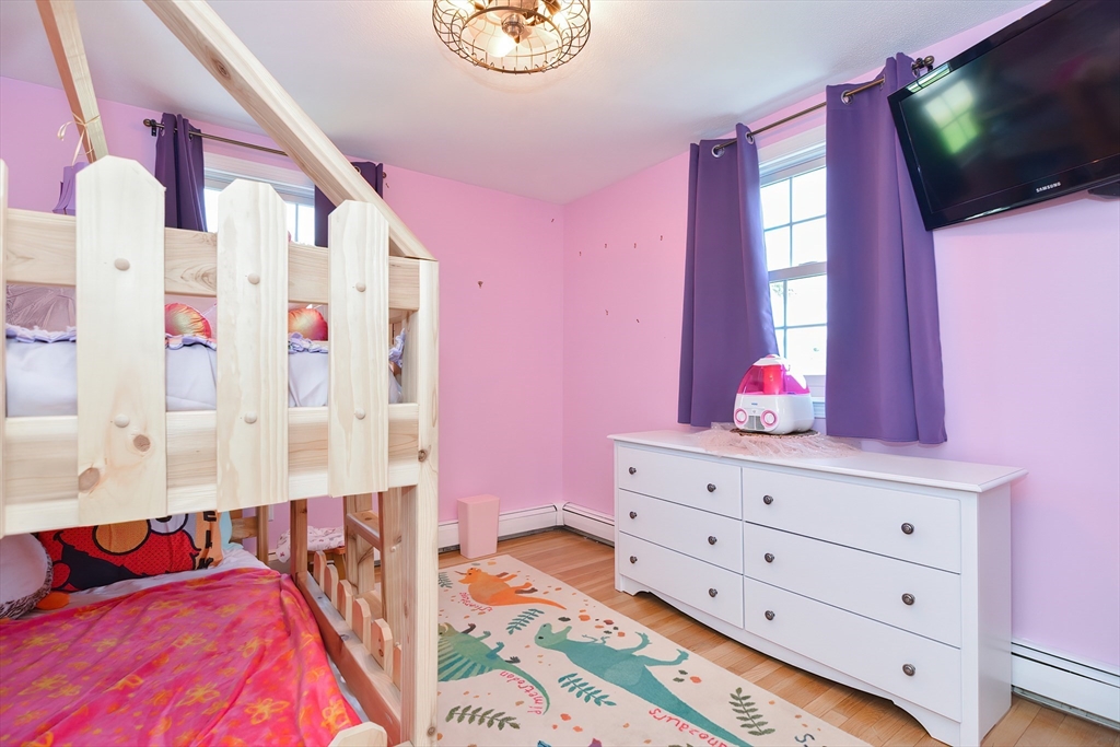 633 Williams Street Dighton, MA 02764 - Photo 26 of 41 a view of bedroom with a bed and flat screen tv