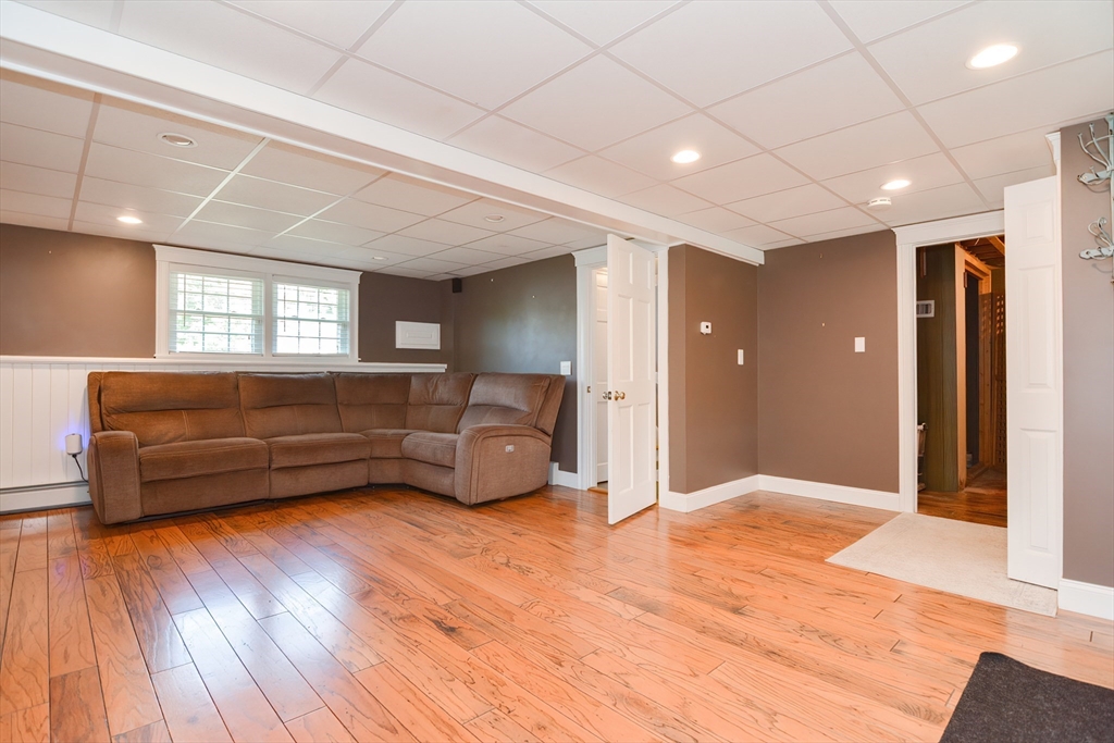 633 Williams Street Dighton, MA 02764 - Photo 30 of 41 a living room with furniture and a wooden floor