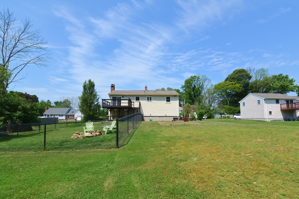 633 Williams Street Dighton, MA 02764 - Photo 39 of 41 a view of a big house with a big yard and a large tree
