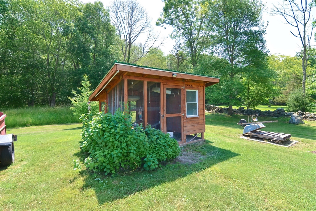 633 Williams Street Dighton, MA 02764 - Photo 40 of 41 a view of front of house with a yard