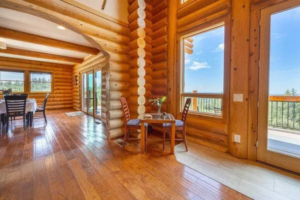 a bedroom with a bed and a desk