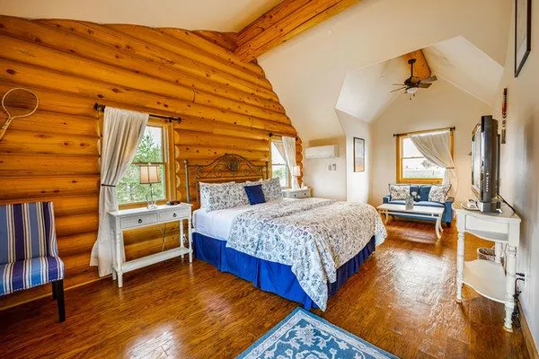 a aerial view of a house with a yard