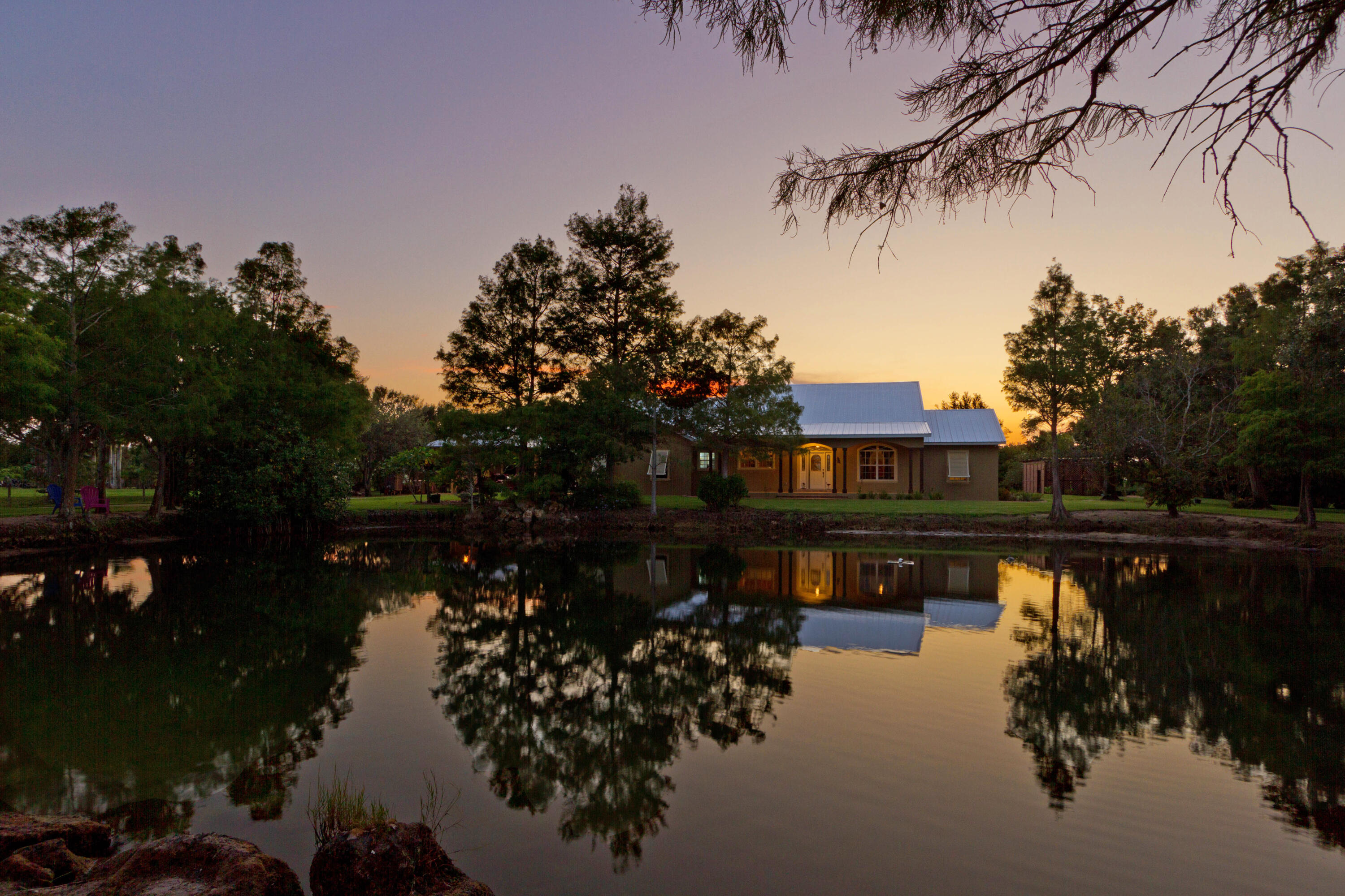 Undisclosed Address Vero Beach, FL 32967 - Photo 1 of 1 a lake view with palm trees