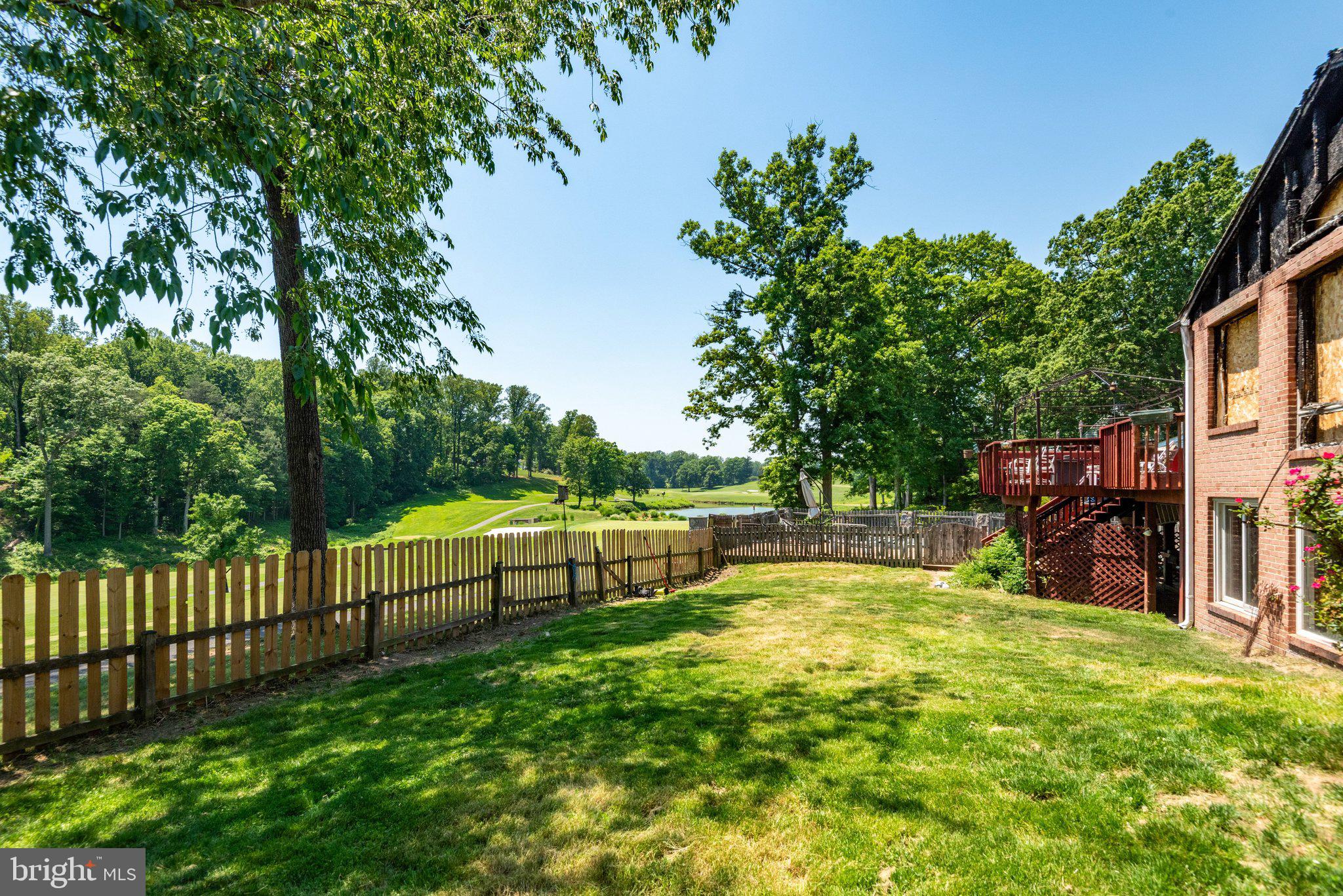 7905 Jansen Court Springfield, VA 22152 - Photo 10 of 26 a view of a swimming pool with a patio and a yard