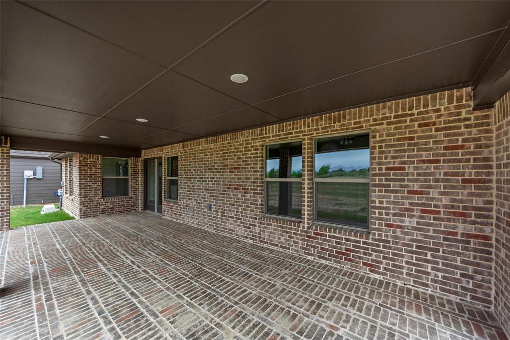 18310 Chippewa Court Terrell, TX 75160 - Photo 28 of 35 a view of backyard with a door