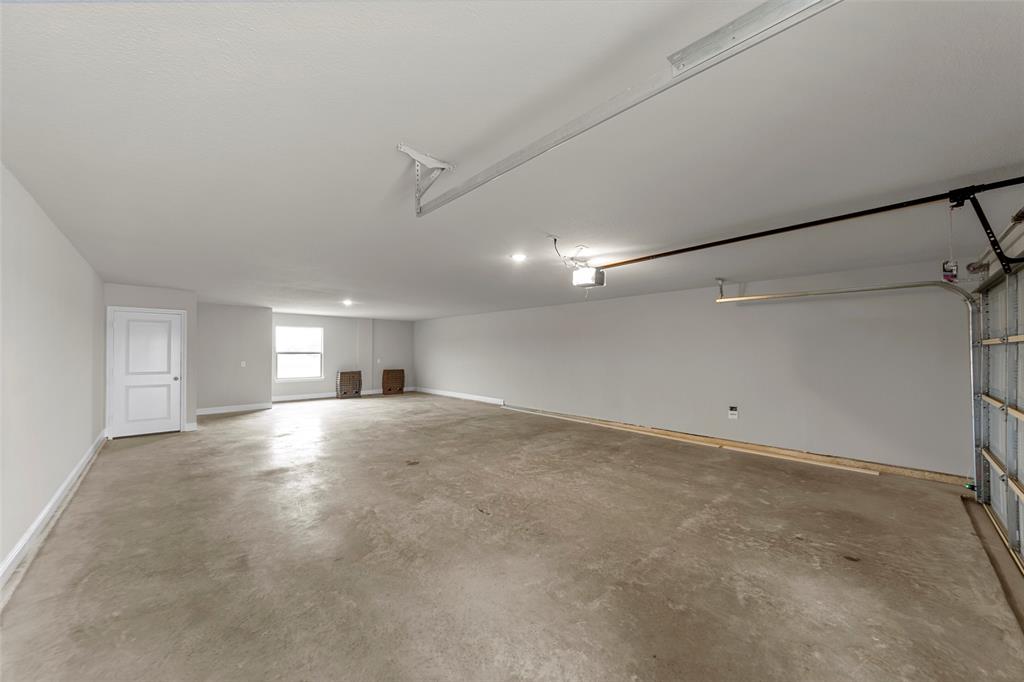 18310 Chippewa Court Terrell, TX 75160 - Photo 31 of 35 a view of empty room with windows and ceiling fan