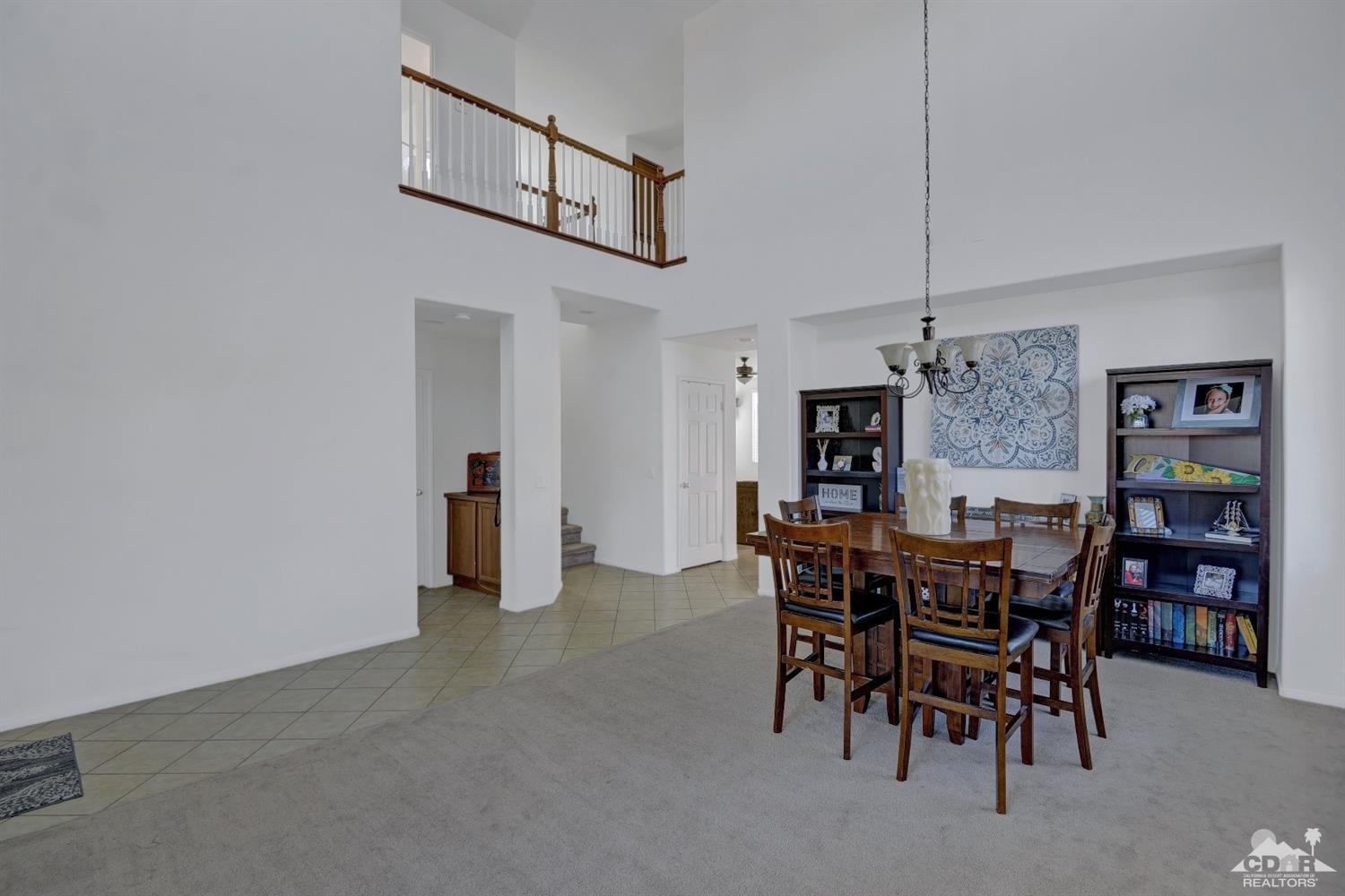 37773 Caprice Drive Indio, CA 92203 - Photo 12 of 26 a view of a dining room with furniture