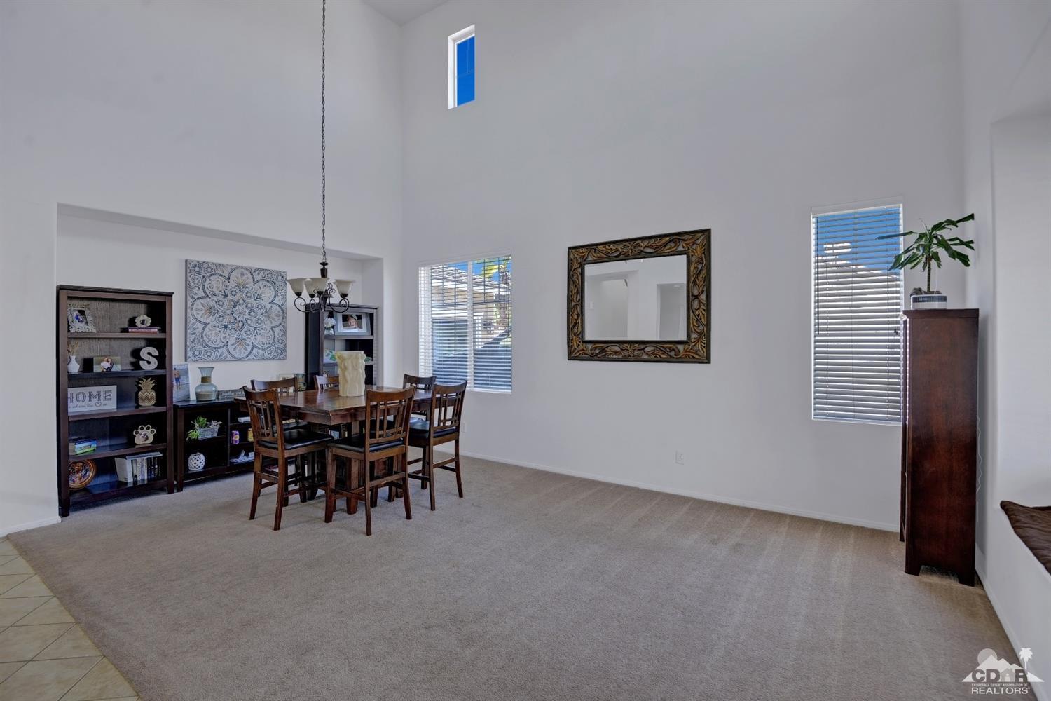 37773 Caprice Drive Indio, CA 92203 - Photo 13 of 26 a dining room with furniture and window