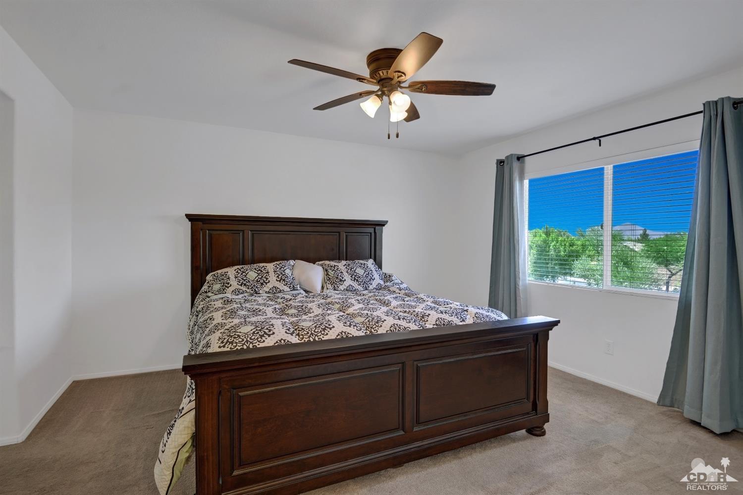 37773 Caprice Drive Indio, CA 92203 - Photo 15 of 26 a room with bed and window