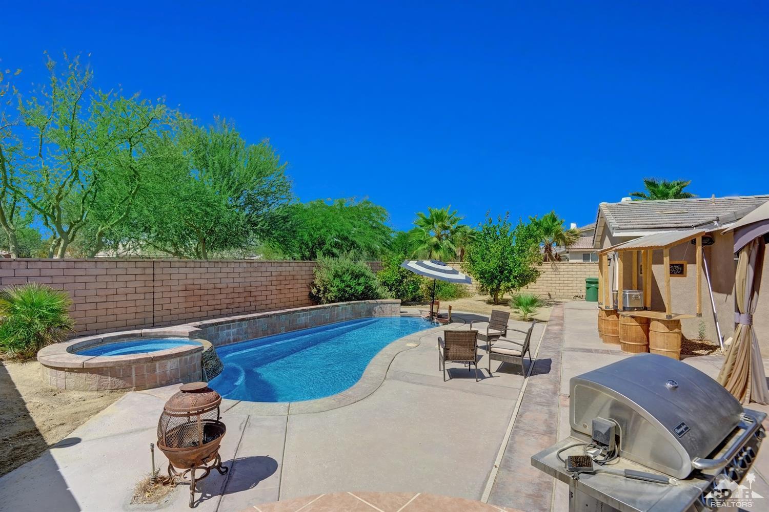 37773 Caprice Drive Indio, CA 92203 - Photo 4 of 26 a view of a chairs and table in the patio