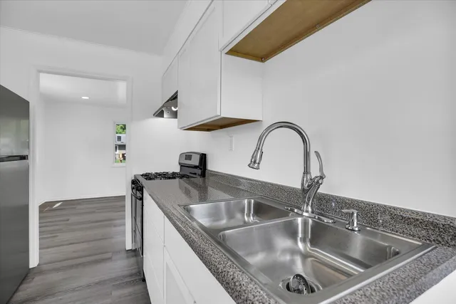 a view of storage and utility room with empty racks