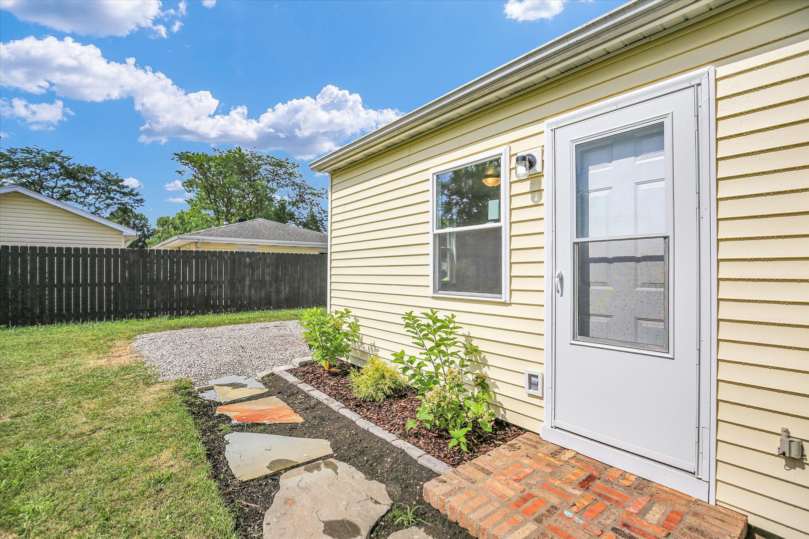 804 Juniper Drive Rantoul, IL 61866 - Photo 20 of 24 a front view of a house with a yard