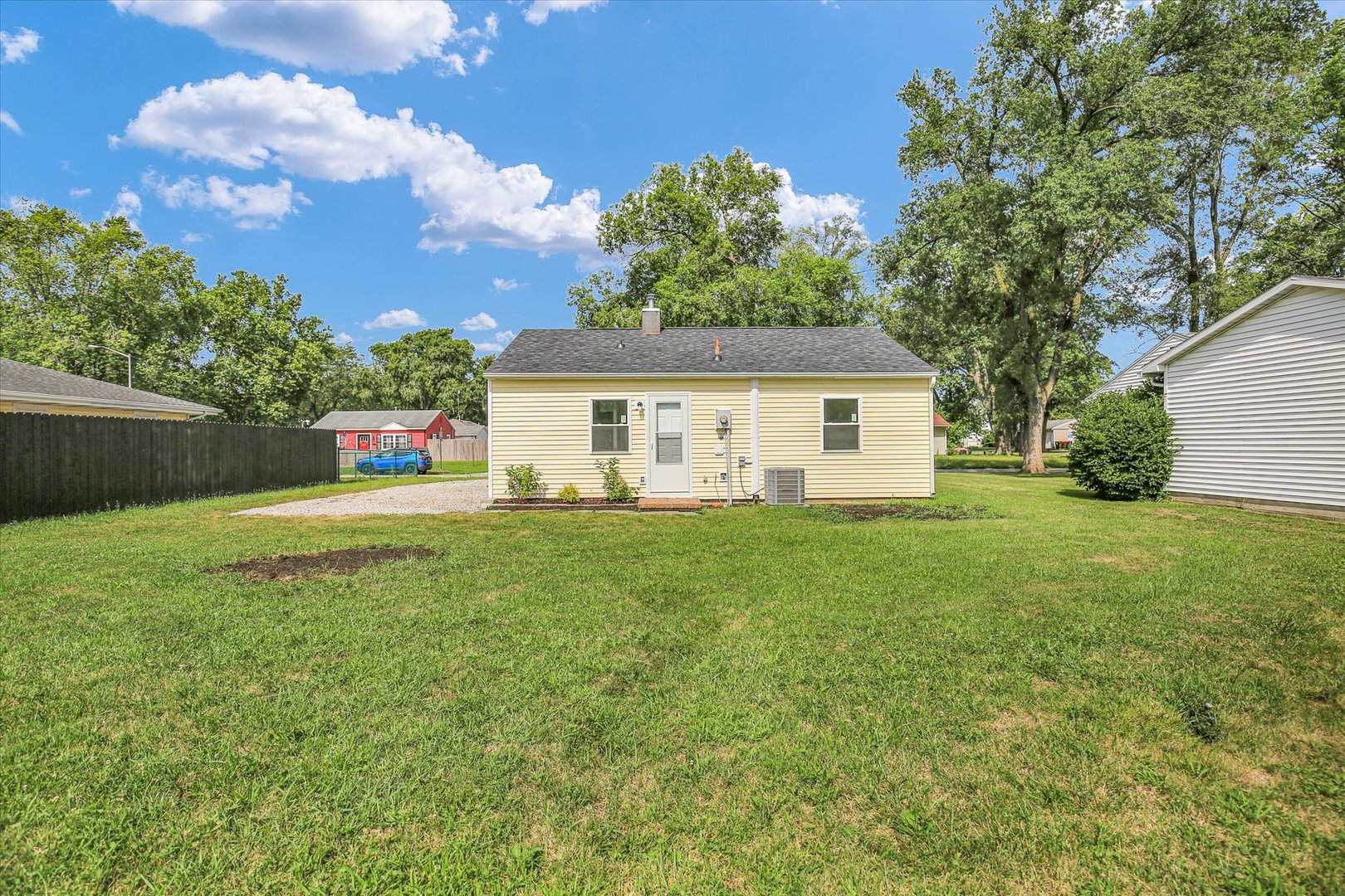 804 Juniper Drive Rantoul, IL 61866 - Photo 22 of 24 a front view of a house with a yard