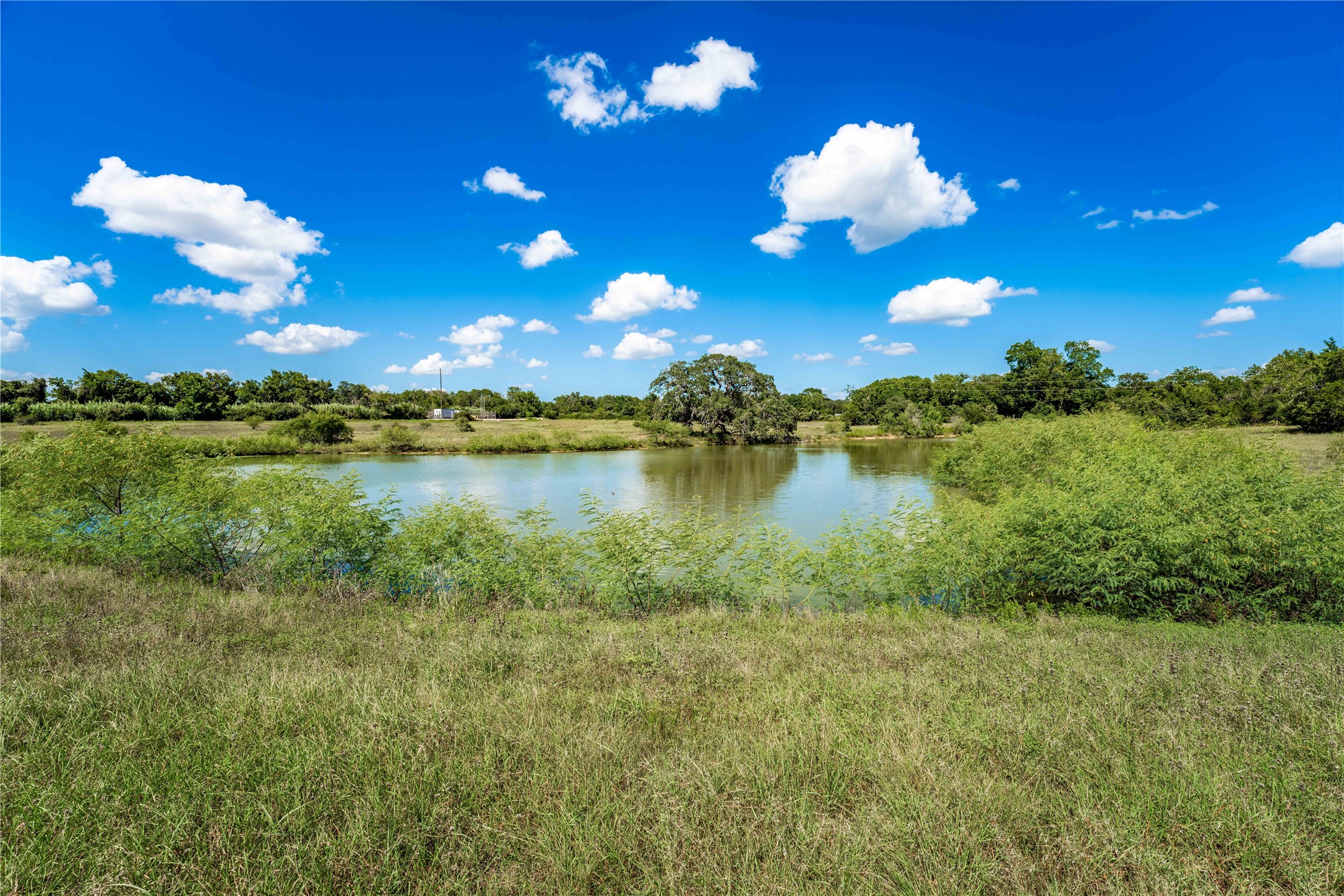 253 Cr 253 Road Weimar, TX 78962 - Photo 27 of 27 a view of a lake with sunset