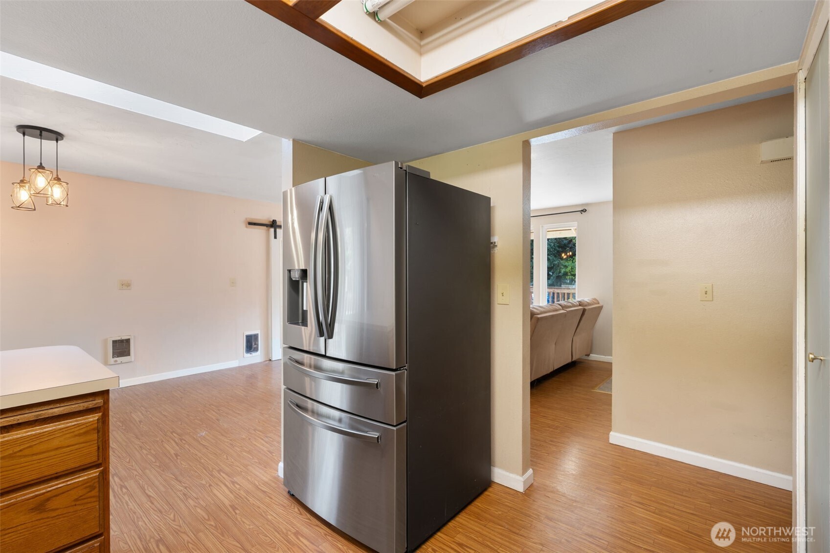 1003 Northwest Dexter Avenue Winlock, WA 98596 - Photo 11 of 39 a kitchen with a refrigerator and a sink