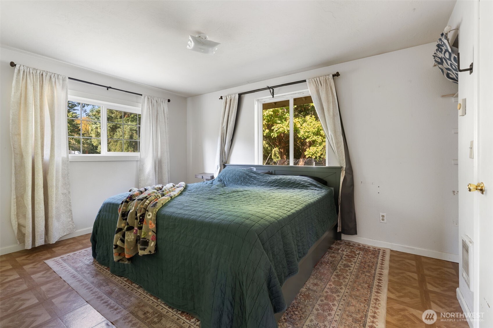 1003 Northwest Dexter Avenue Winlock, WA 98596 - Photo 20 of 39 a bedroom with a bed and a window