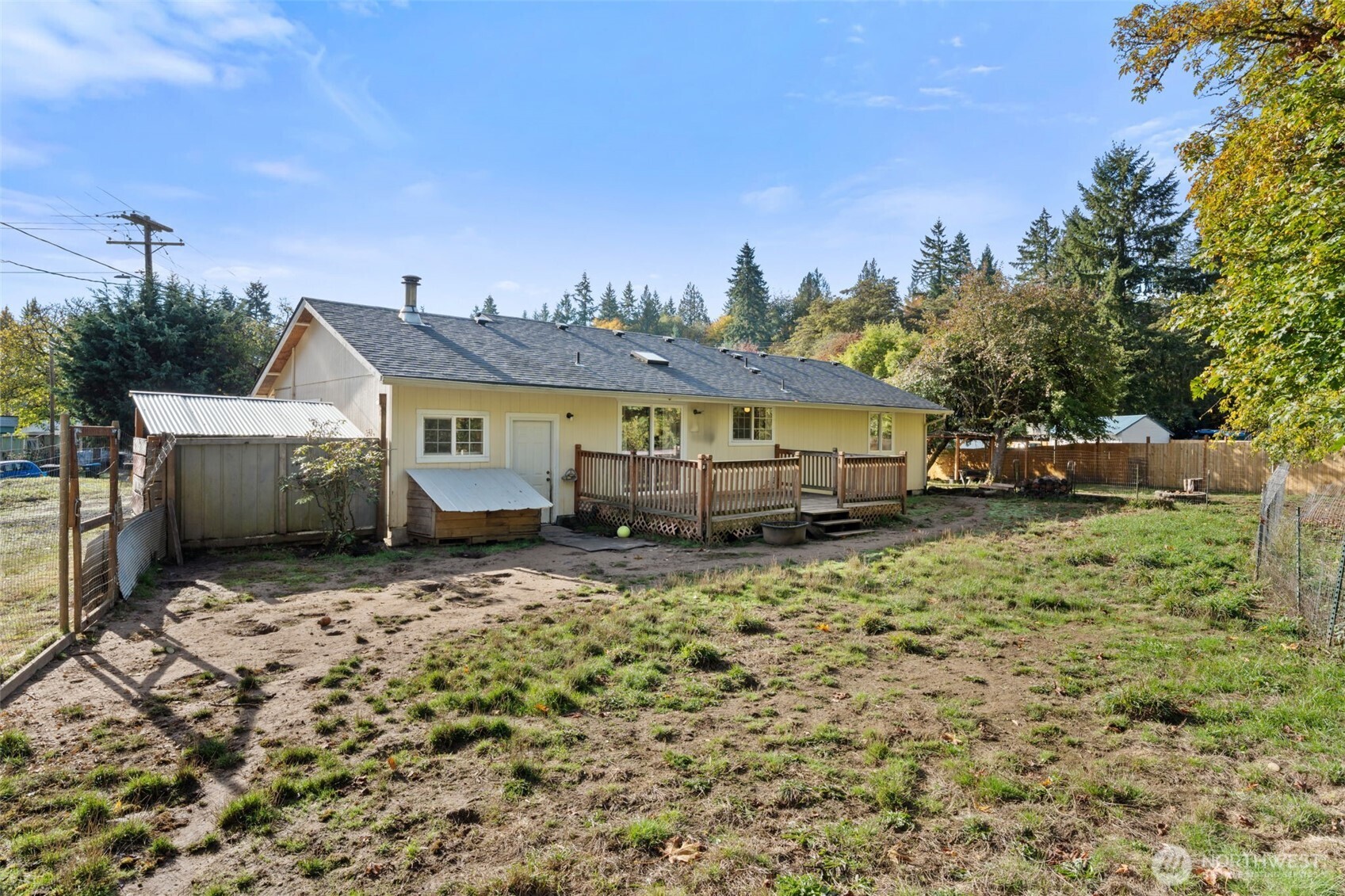 1003 Northwest Dexter Avenue Winlock, WA 98596 - Photo 30 of 39 a front view of house with yard outdoor seating and barbeque oven