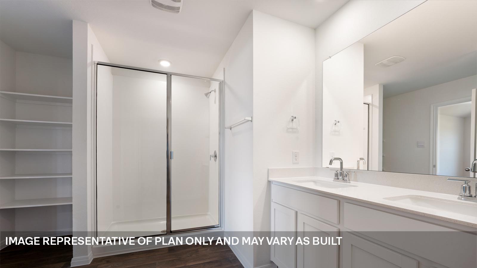 185 Mountain Pea Road Kyle, TX 78640 - Photo 13 of 22 a bathroom with a double vanity sink and a mirror