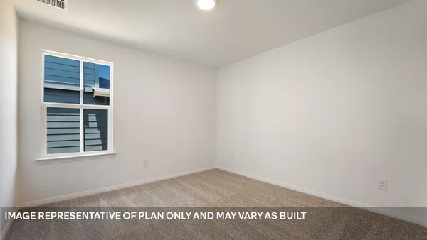 a view of empty room with windows