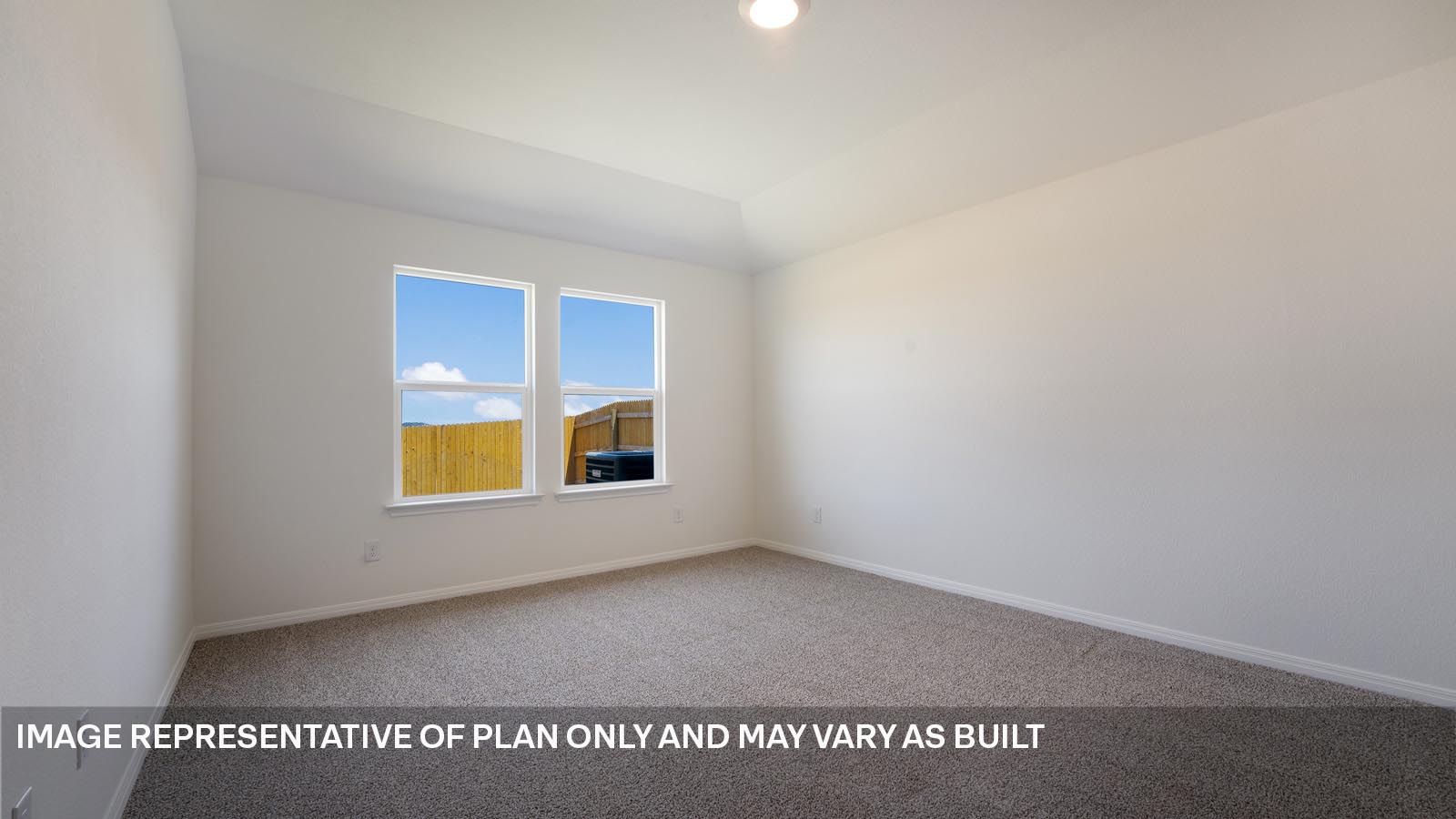 185 Mountain Pea Road Kyle, TX 78640 - Photo 10 of 22 an empty room with windows