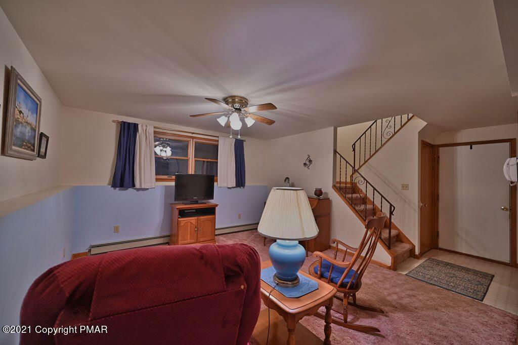 168 Shenkel Road Effort, PA 18330 - Photo 45 of 64 a bedroom with furniture and a window