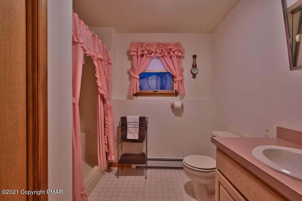 168 Shenkel Road Effort, PA 18330 - Photo 48 of 64 a bathroom with a toilet and sink