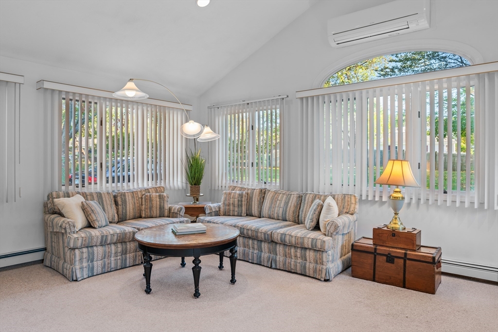28 Robinson Road Woburn, MA 01801 - Photo 13 of 42 a living room with furniture and a large window