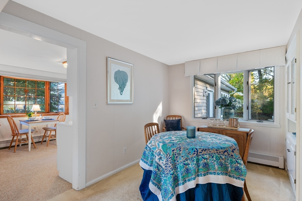 28 Robinson Road Woburn, MA 01801 - Photo 23 of 42 a bedroom with a bed and a table chair