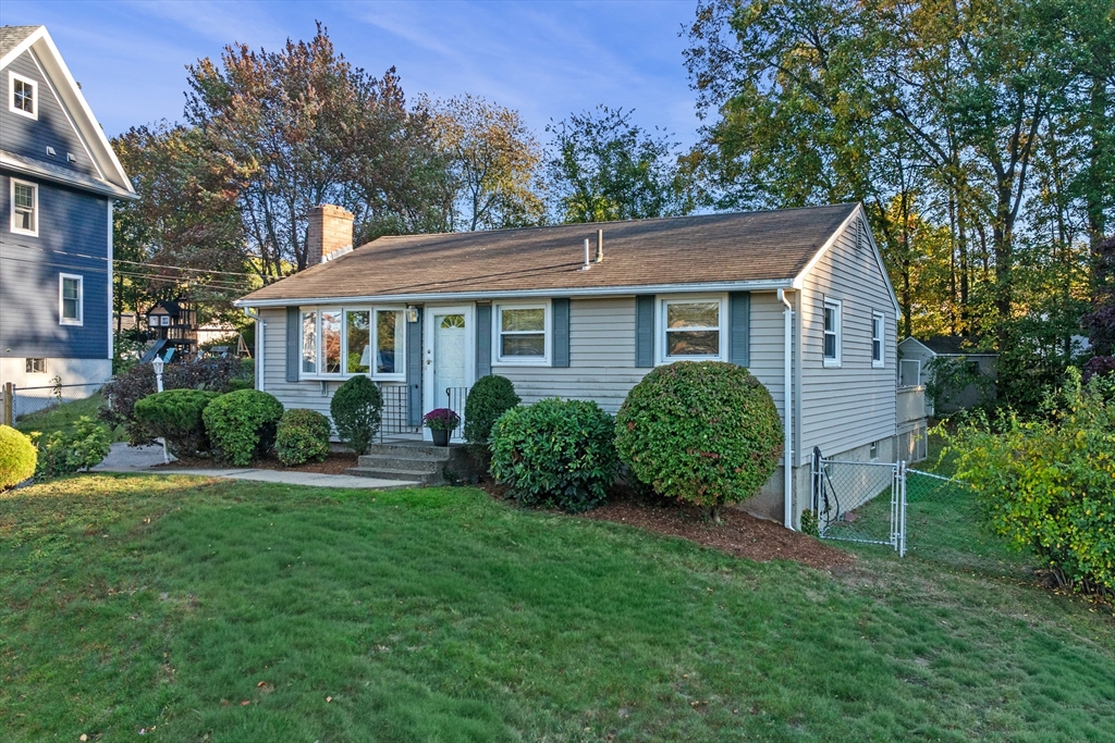 28 Robinson Road Woburn, MA 01801 - Photo 3 of 42 a view of outdoor space yard and front view of a house