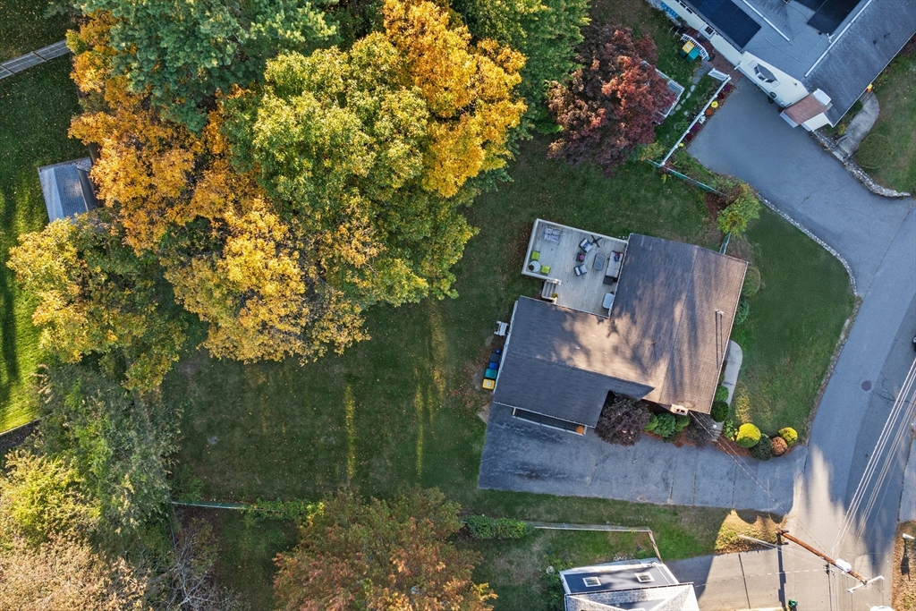 28 Robinson Road Woburn, MA 01801 - Photo 8 of 42 an aerial view of a house with a yard