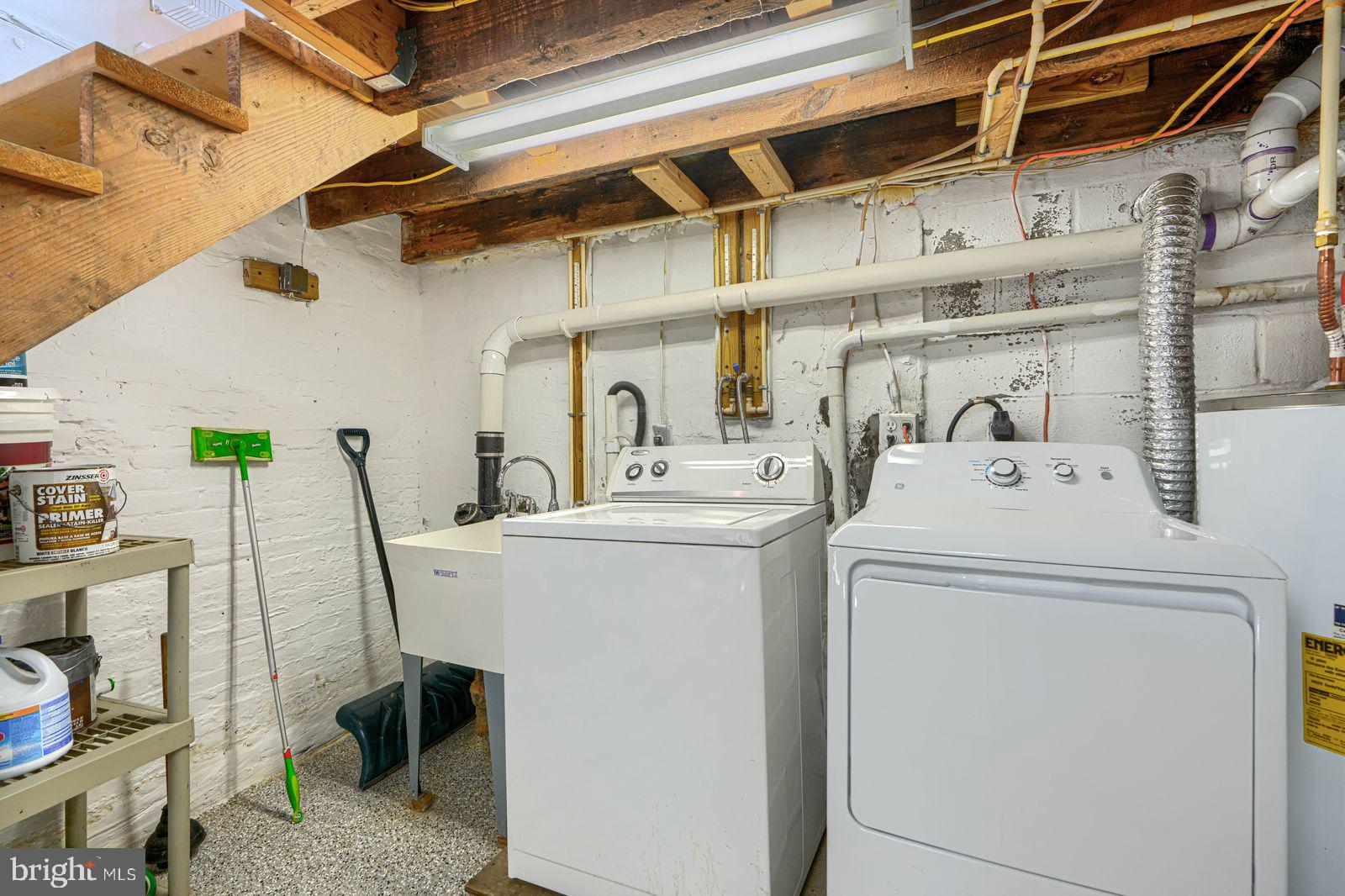 1026 Patapsco Street Baltimore, MD 21230 - Photo 23 of 24 a utility room with dryer and washer