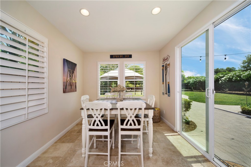 5572 Thoroughbred Street Oceanside, CA 92057 - Photo 11 of 38 a dining room with furniture and window