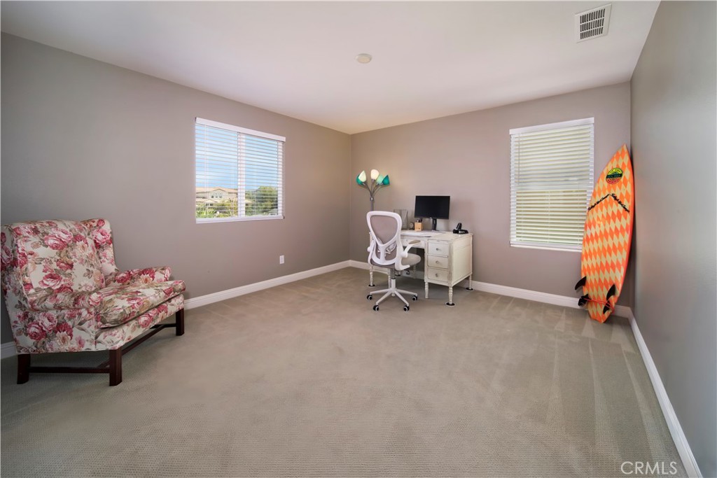 5572 Thoroughbred Street Oceanside, CA 92057 - Photo 15 of 38 a view of a livingroom with furniture and a couch