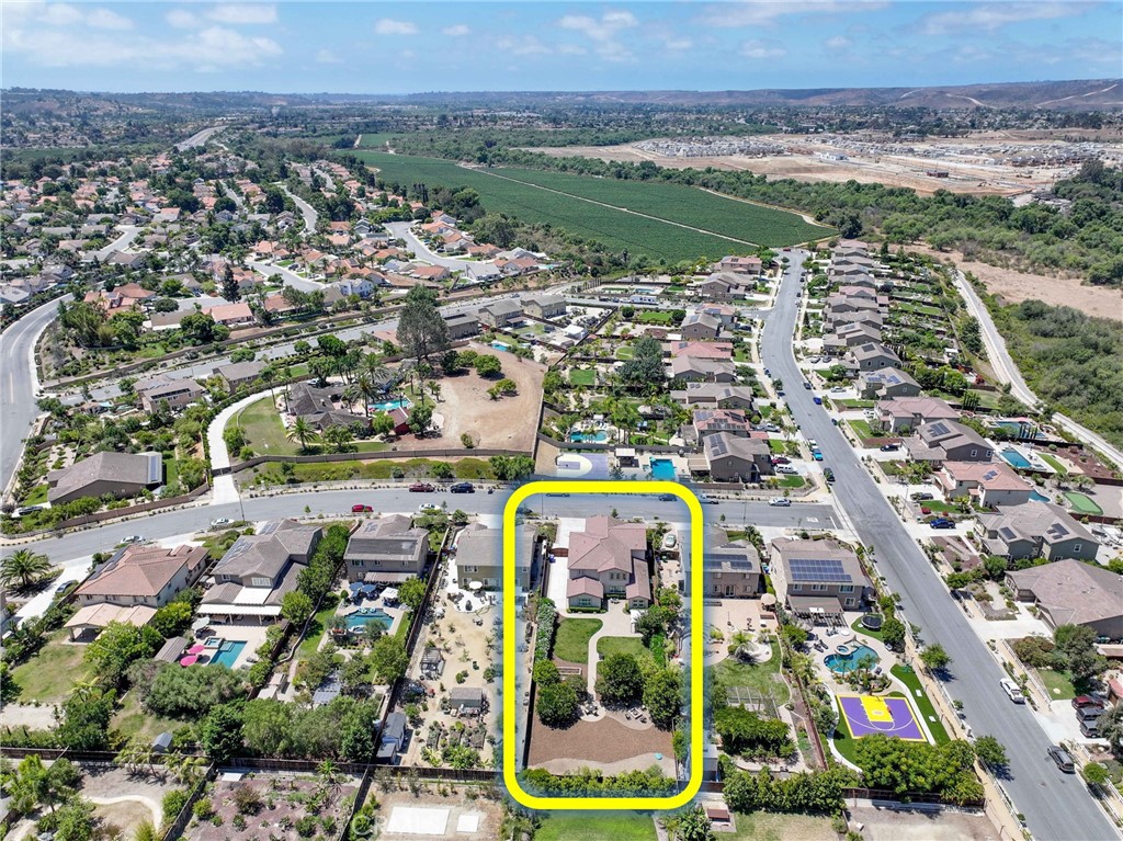 5572 Thoroughbred Street Oceanside, CA 92057 - Photo 28 of 38 an aerial view of residential house and lake