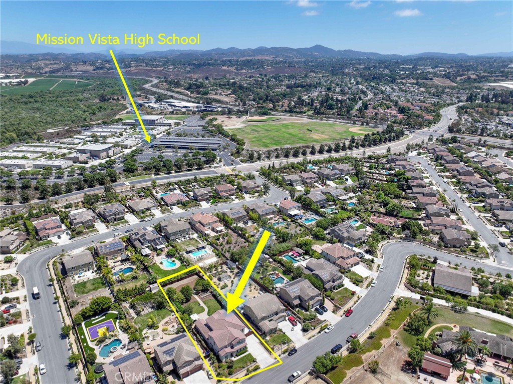 5572 Thoroughbred Street Oceanside, CA 92057 - Photo 29 of 38 an aerial view of residential houses with outdoor space and street view