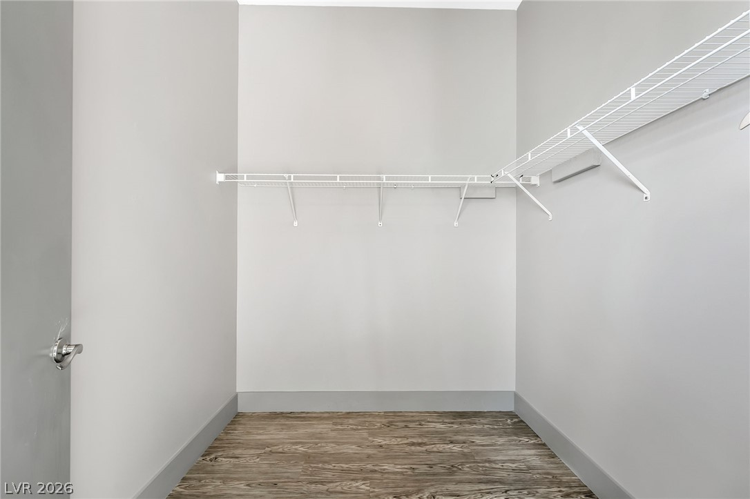 2775 West Pebble Road, Unit 505 Las Vegas, NV 89123 - Photo 11 of 26 Ample storage solutions await in this naturally illuminated walk-in closet with durable flooring.
